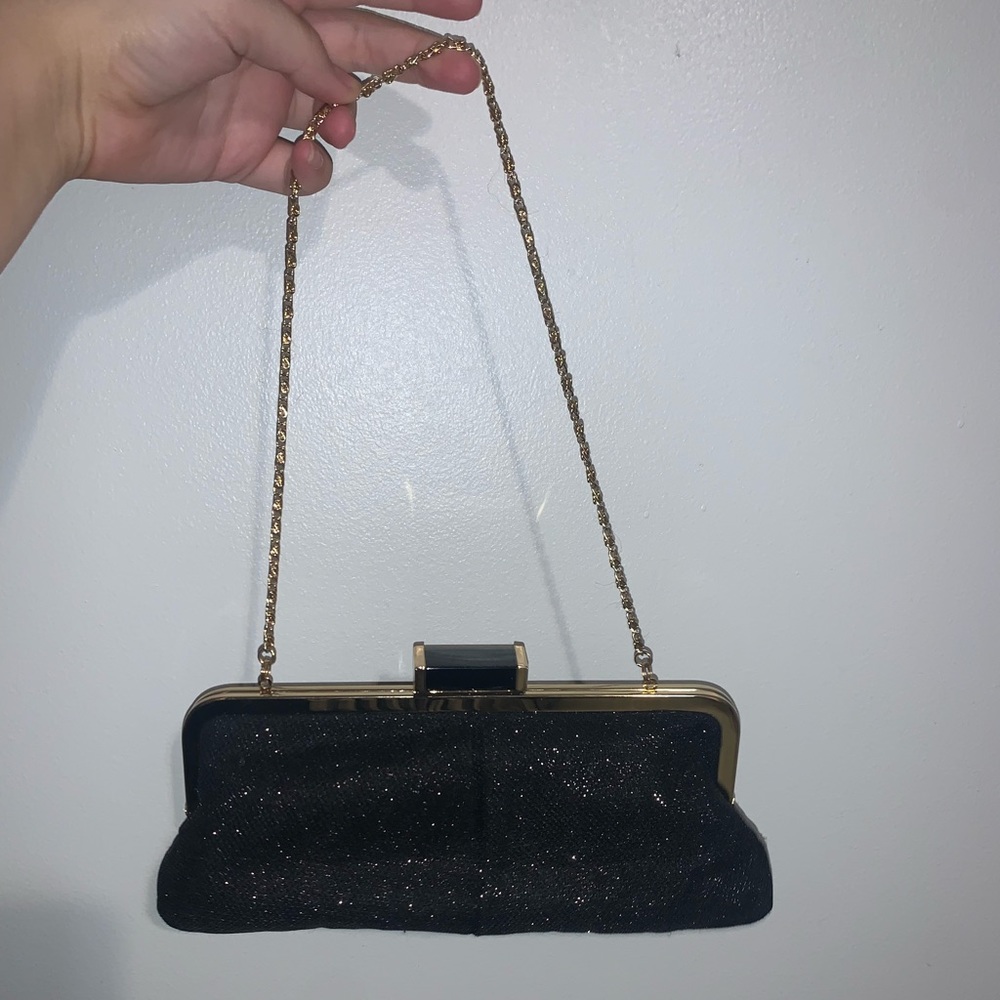 black sparkly purse.